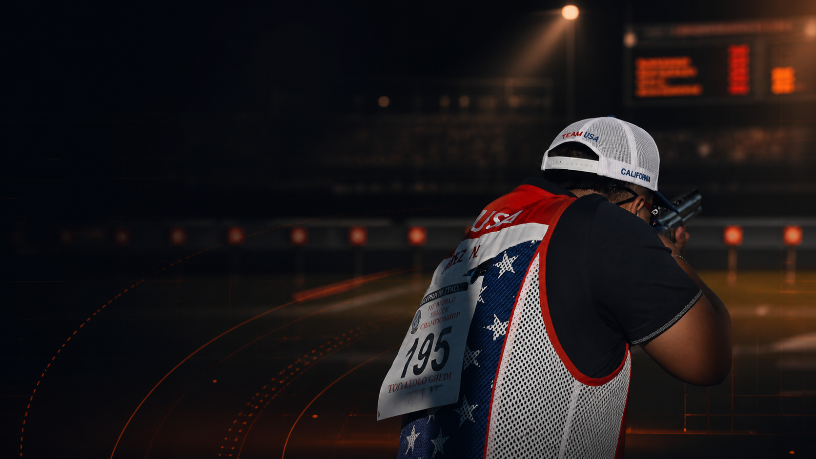 Team USA competitive shooter focused on a target at an international sporting event.